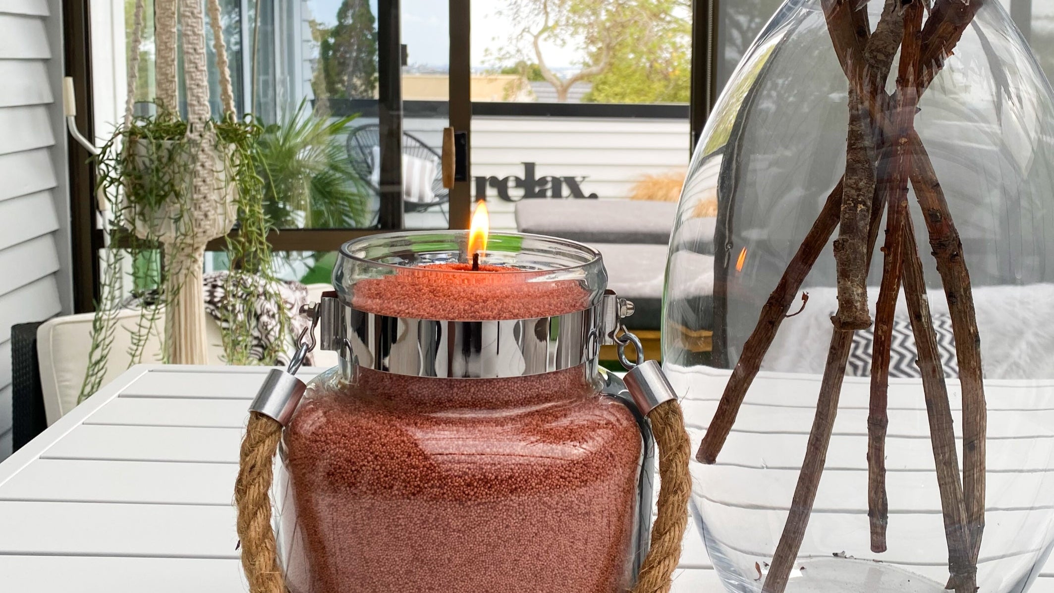 Decorative outdoor sandwax candle in our rustic coral. Bringing a unique outdoor centrepiece