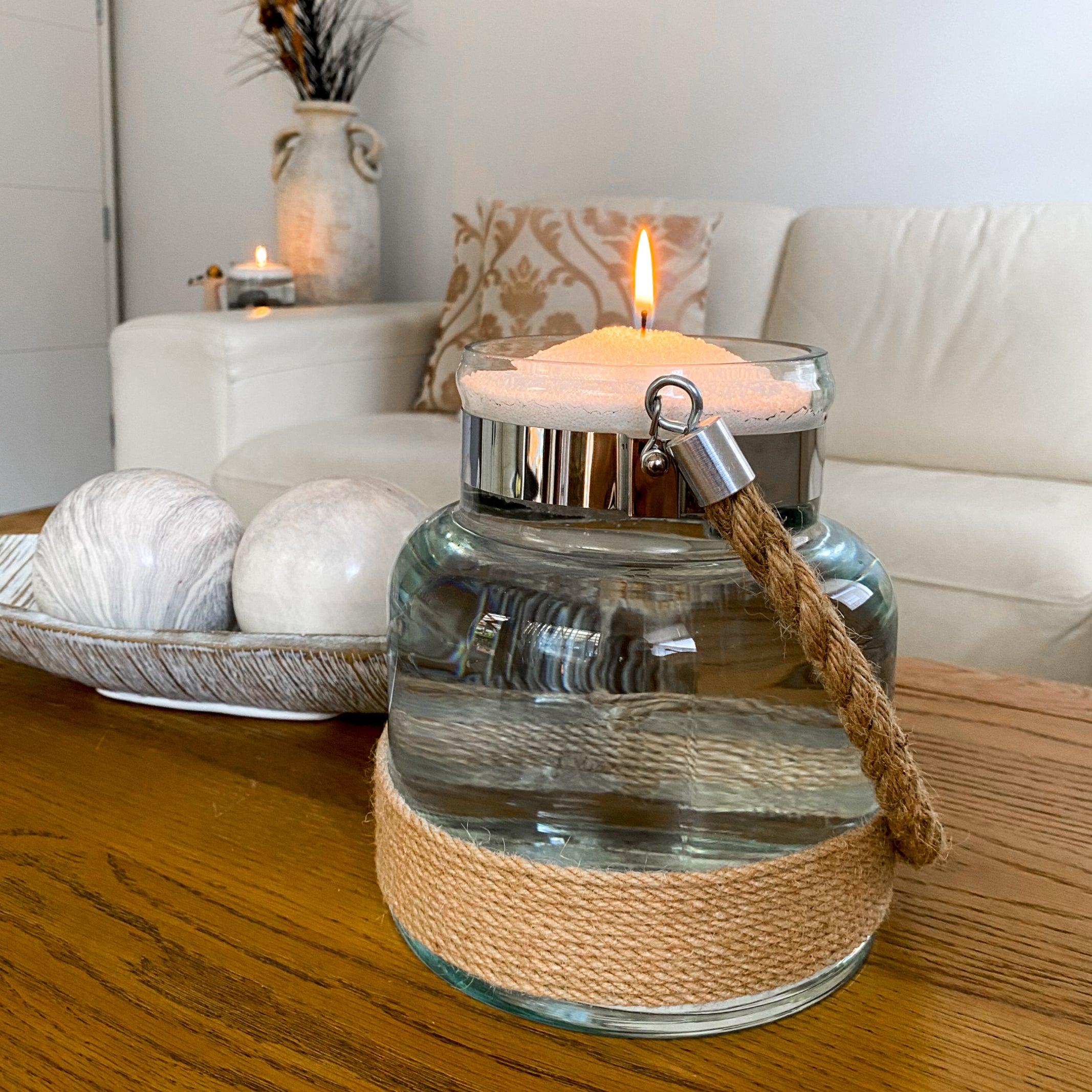 Coastal white sandwax floats on water to create unique centre piece candles