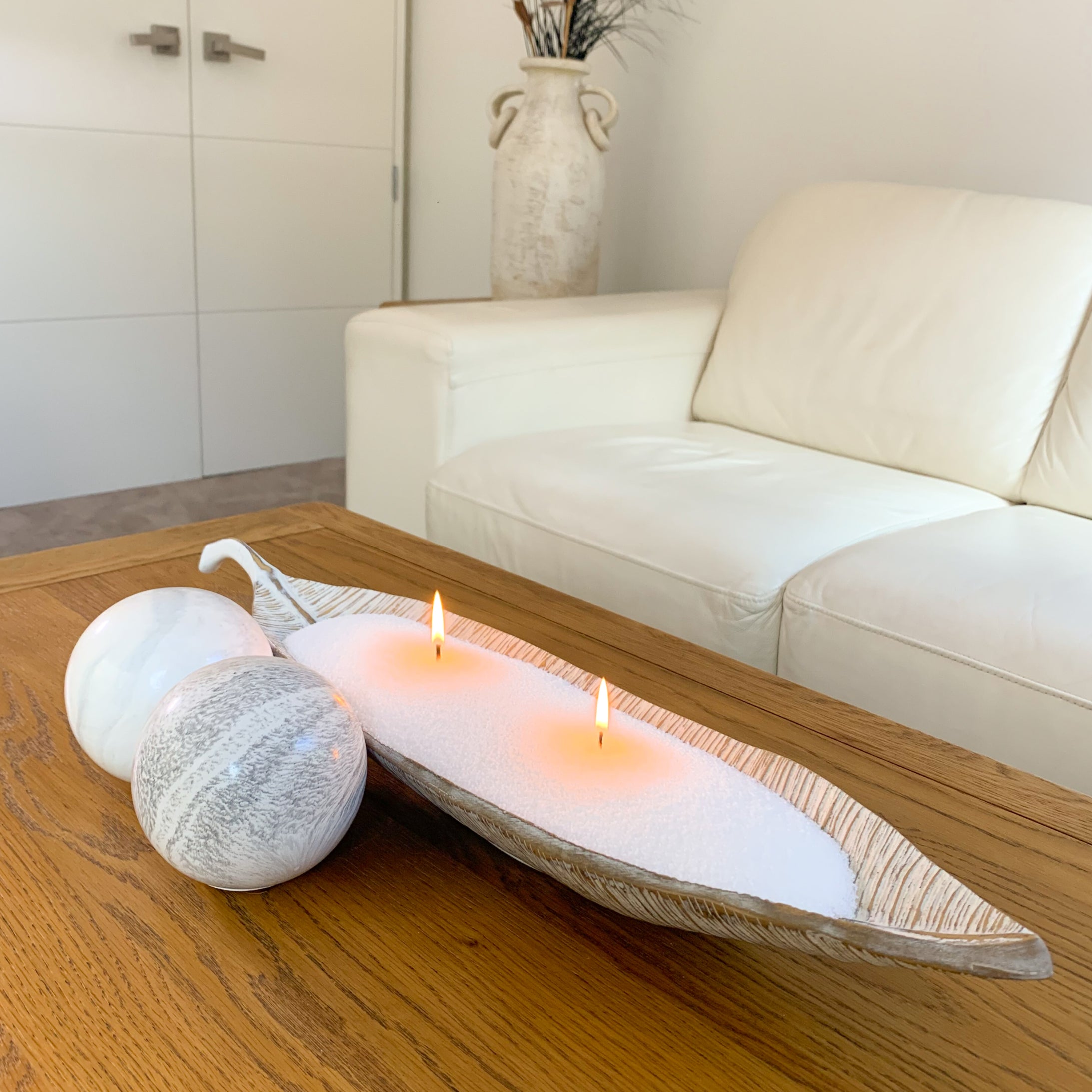 White Sandwax in decorative bowl on coffee table