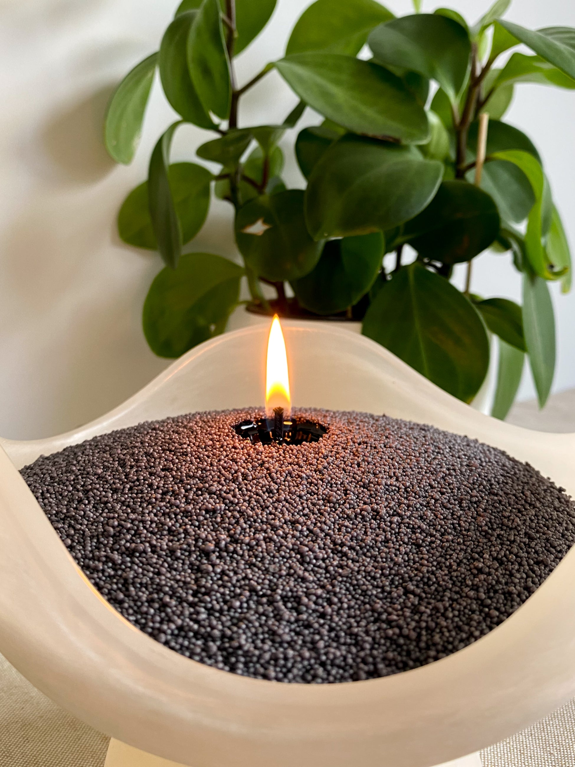 Soft charcoal sandwax filled in this ceramic vessel. Clean burning and eco friendly